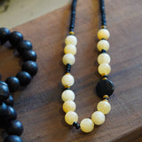 COLLAR PIEDRAS AMARILLO NEGRO