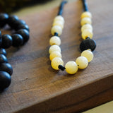 COLLAR PIEDRAS AMARILLO NEGRO