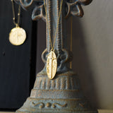 COLLAR MEDALLA  CRUZ OVALADA CIRCÓN ENCHAPADO EN ORO