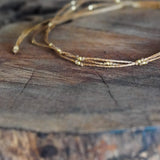 COLLAR HILO TRIPLE AJUSTABLE ENCHAPE ORO