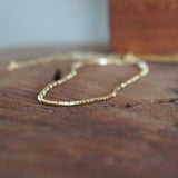 COLLAR MOSTACILLAS ENCHAPE ORO