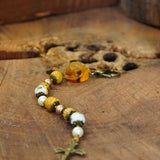 DENARIO FLOR OCRE