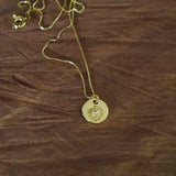 COLLAR MEDALLA DETENTE ENCHAPE ORO