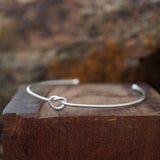 PULSERA ESCLAVA NUDO ENCHAPE PLATA MATE