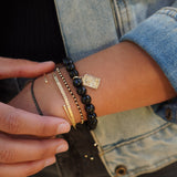 PULSERA ESCLAVA DELGADA TORCIDA ENCHAPE ORO