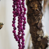 COLLAR SEMILLAS MORADO