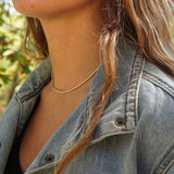 COLLAR MOSTACILLAS ENCHAPE ORO