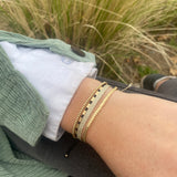 PULSERA TELAR DELGADA INVIERNO DORADO