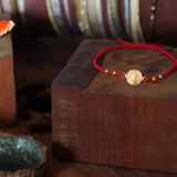 PULSERA SAN BENITO MOSTACILLAS ROJAS ENCHAPE ORO