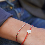 PULSERA SAN BENITO MOSTACILLAS ROJAS ENCHAPE ORO