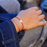 PULSERA SAN BENITO MOSTACILLAS ROJAS ENCHAPE ORO