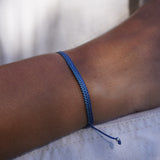 PULSERA TELAR DELGADA AZUL CELESTE