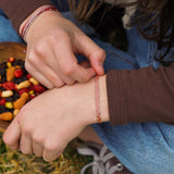 PULSERA TELAR DELGADA ONDAS ROSAS TEEN