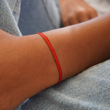 PULSERA TELAR DELGADA ROJO BERMELLÓN