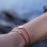 PULSERA VIRGEN DE LOS RAYOS ROJA ENCHAPE ORO