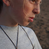 CRUZ PLATA CUERO NIÑO