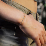 PULSERA CRUZ NUDOS GOLD FILLED TEEN