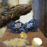 AROS FLOR GÉNERO AZUL MORADA