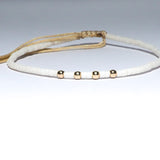 PULSERA GUADALUPE CREMA GOLDFILLED