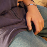 PULSERA CRUZ MACRAMÉ NIÑO