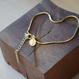 PULSERA M PAZ ENCHAPE ORO CON ACCESORIO