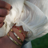 PULSERA VIRGEN MOSTACILLAS ROJAS ENCHAPE ORO