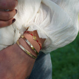 PULSERA VIRGEN MOSTACILLAS ROJAS ENCHAPE ORO