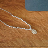 COLLAR NUDOS MINI VIRGEN DE LOS RAYOS TEEN